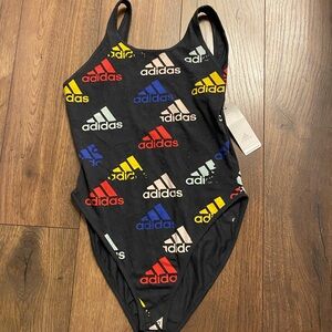 Addidas body suit open back.
- multi coloured